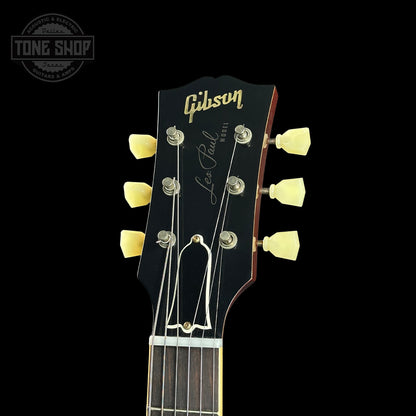 Gibson Les Paul guitar headstock on a black background