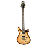 Electric guitar with a sunburst finish on a white background