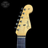 Fender guitar headstock on a black background with 'Tone Shop' logo.
