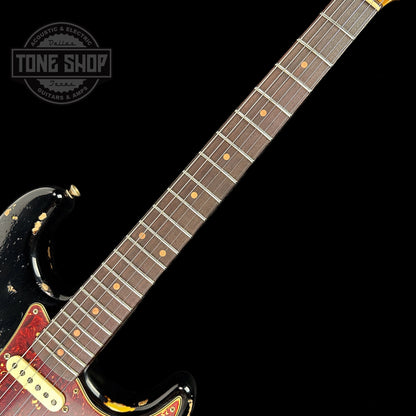 Fretboard of Fender Custom Shop Limited Edition Roasted '60 Strat Super Heavy Relic Aged Black Over 3 Color Sunburst.