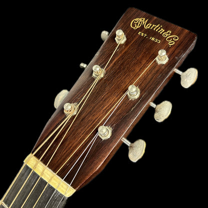 Front of headstock of Used Martin Custom Shop 000-28 Authentic 1937 Stage 1 Aging Ambertone Burst.