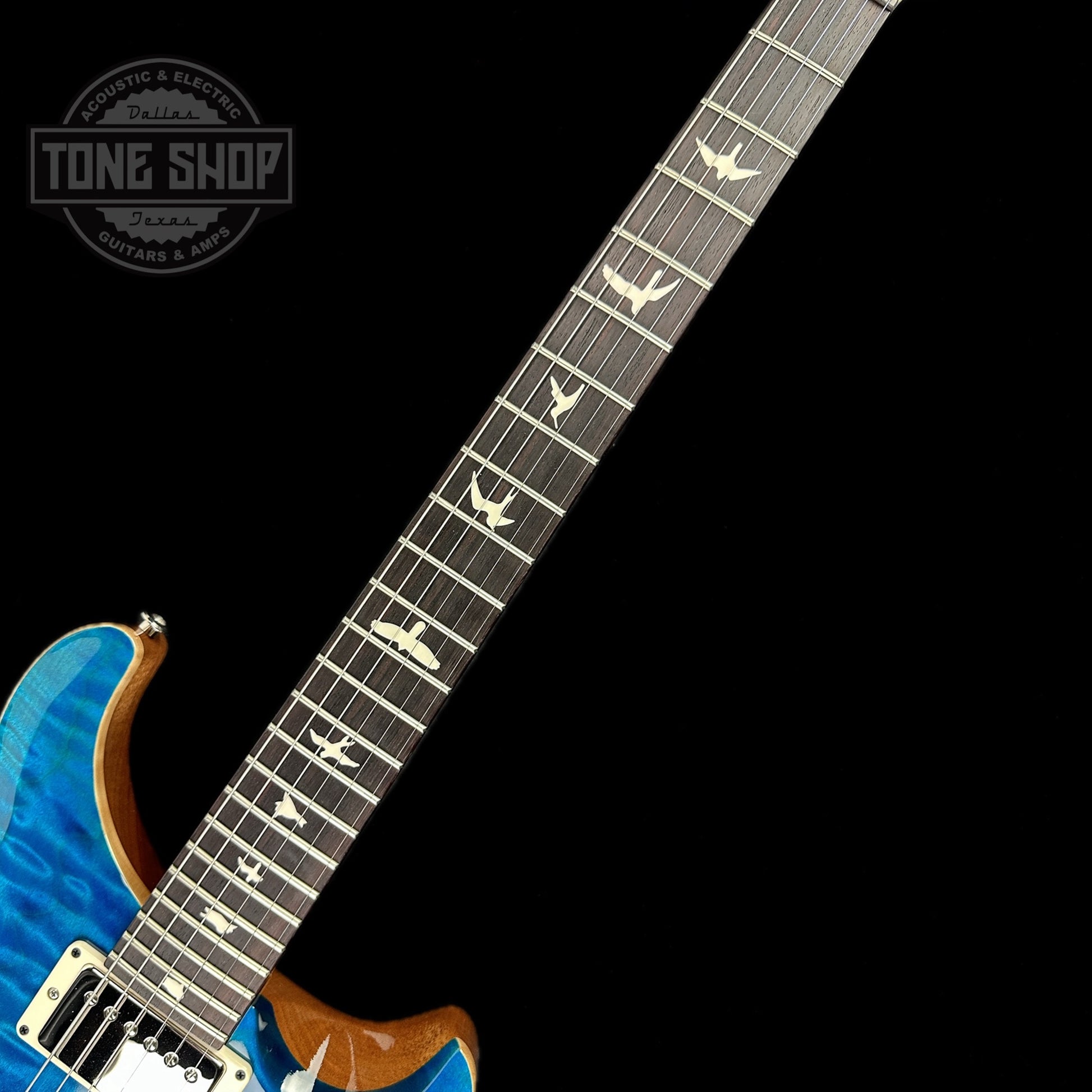 Fretboard of PRS Paul Reed Smith CE24 Semi-Hollow Quilt Blue Matteo.