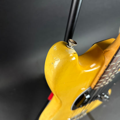 Damage near upper strap button of Vintage 1978 Fender MusicMaster Bass.