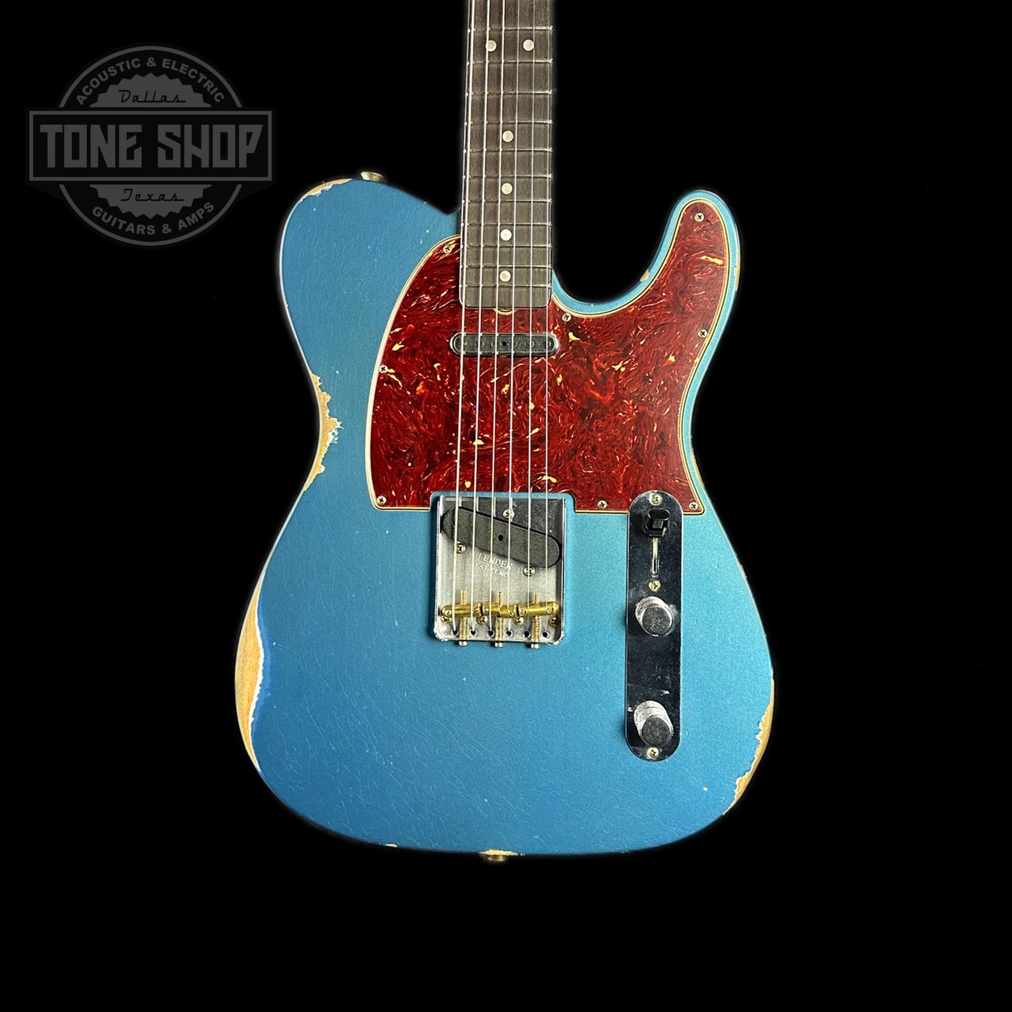 Front of body of Fender Custom Shop Limited Edition '64 Tele Relic Aged Lake Placid Blue.