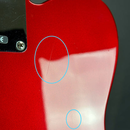 Scratches on back of Used 2000 Fender Custom Shop 63 Telecaster NOS Candy Apple Red.