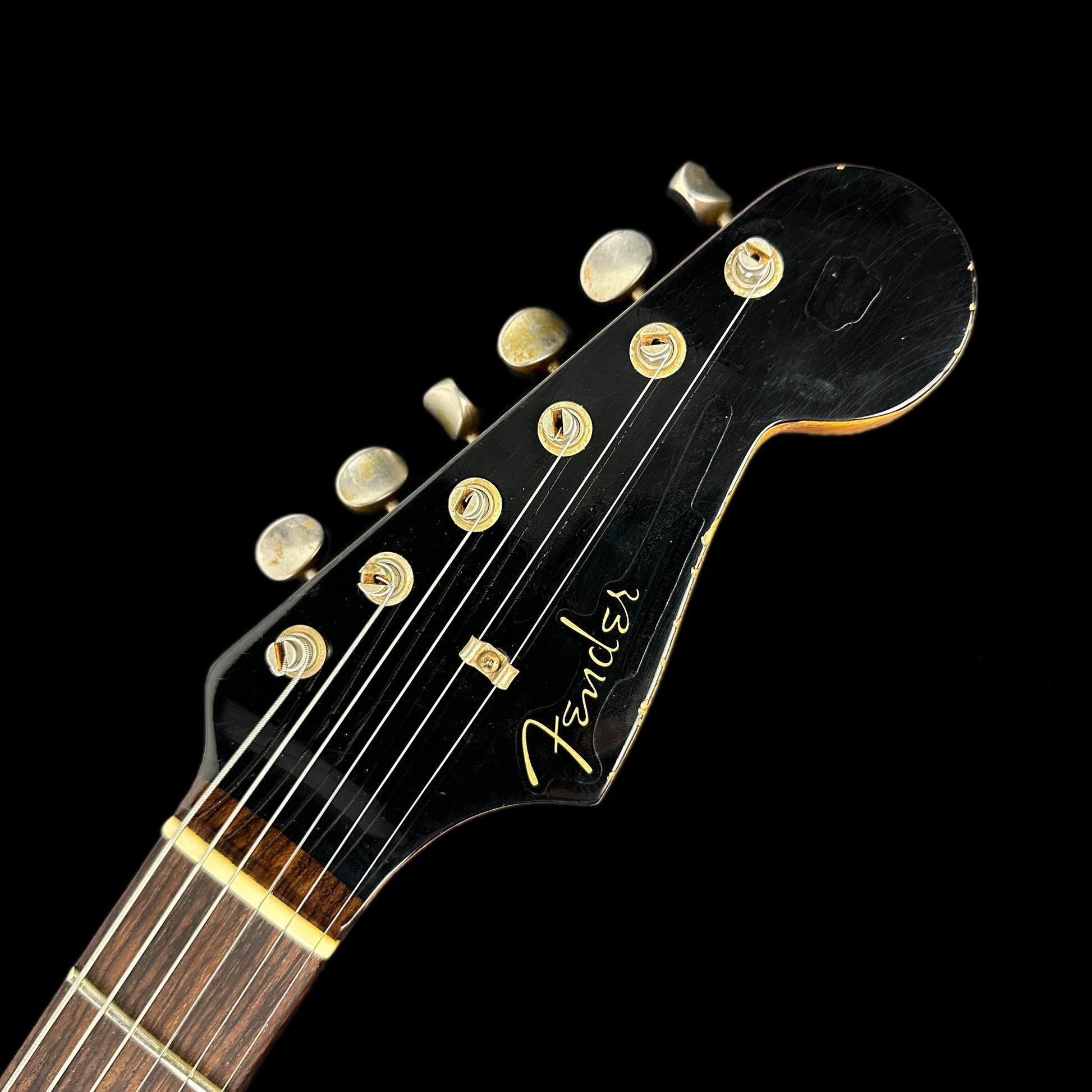 Front of headstock of Used Fender Dual Mag Stratocaster.