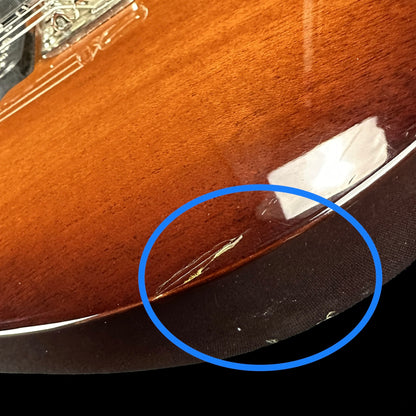 Series of chips in finish on lower front left of body.