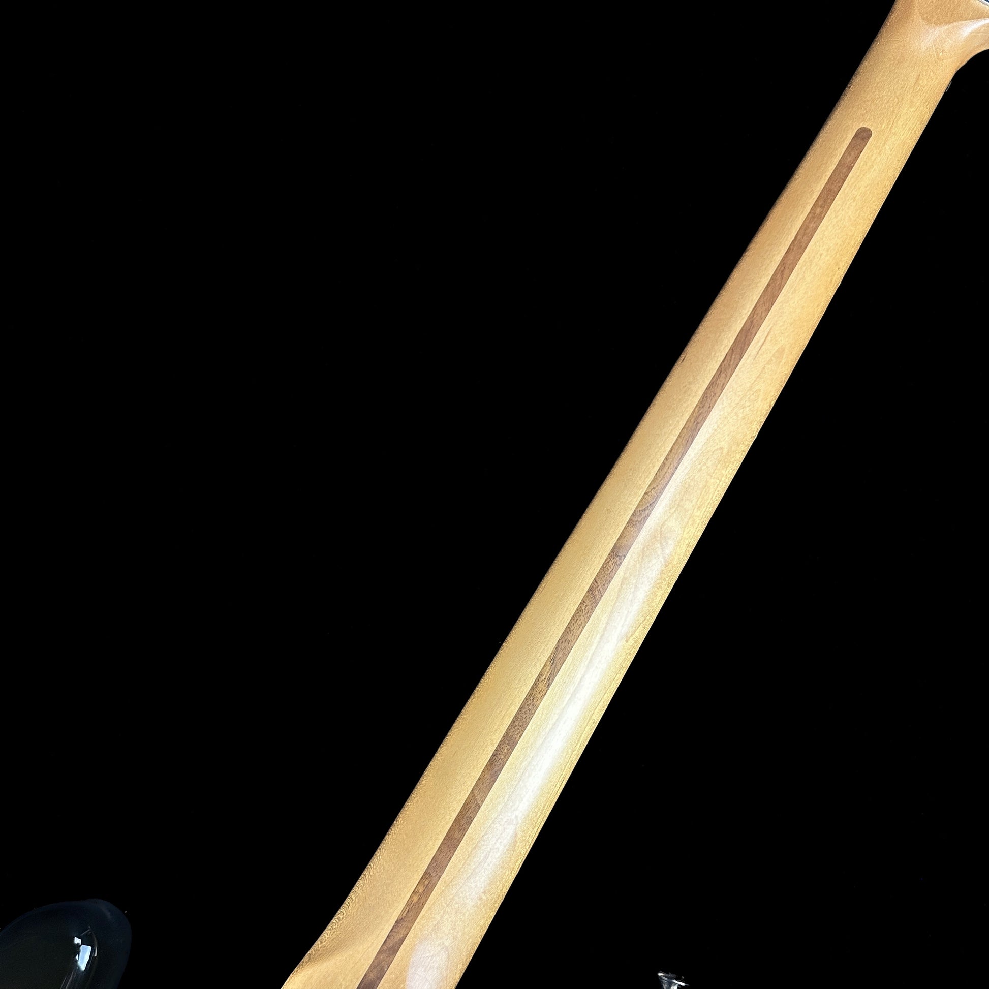 Back of neck of Used 2009 Fender Standard Precision Bass Brown Sunburst.