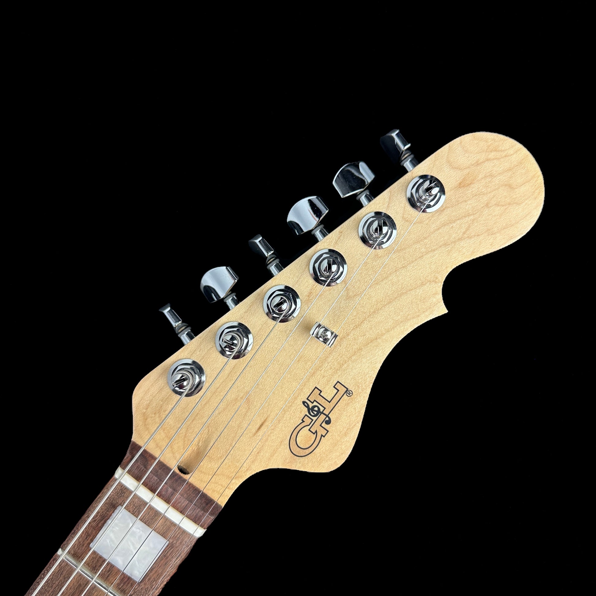 Front of headstock of G&L USA Doheny Tobacco Sunburst.