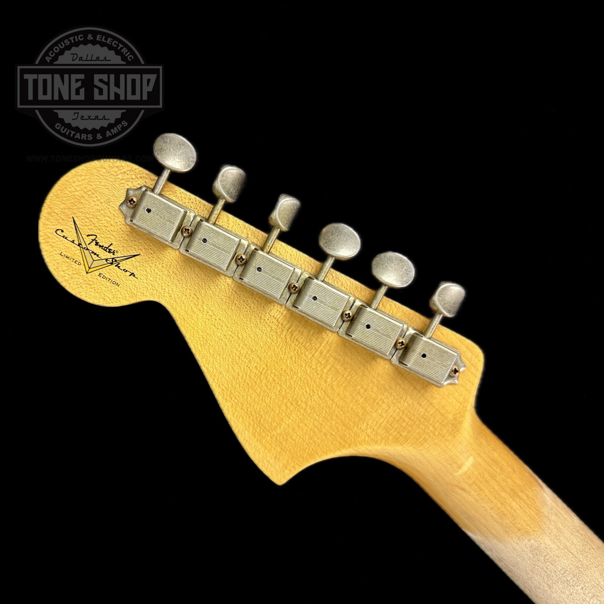 Back of headstock of Fender Custom Shop Limited Edition Bass VI Journeyman Relic Aged Dakota Red.