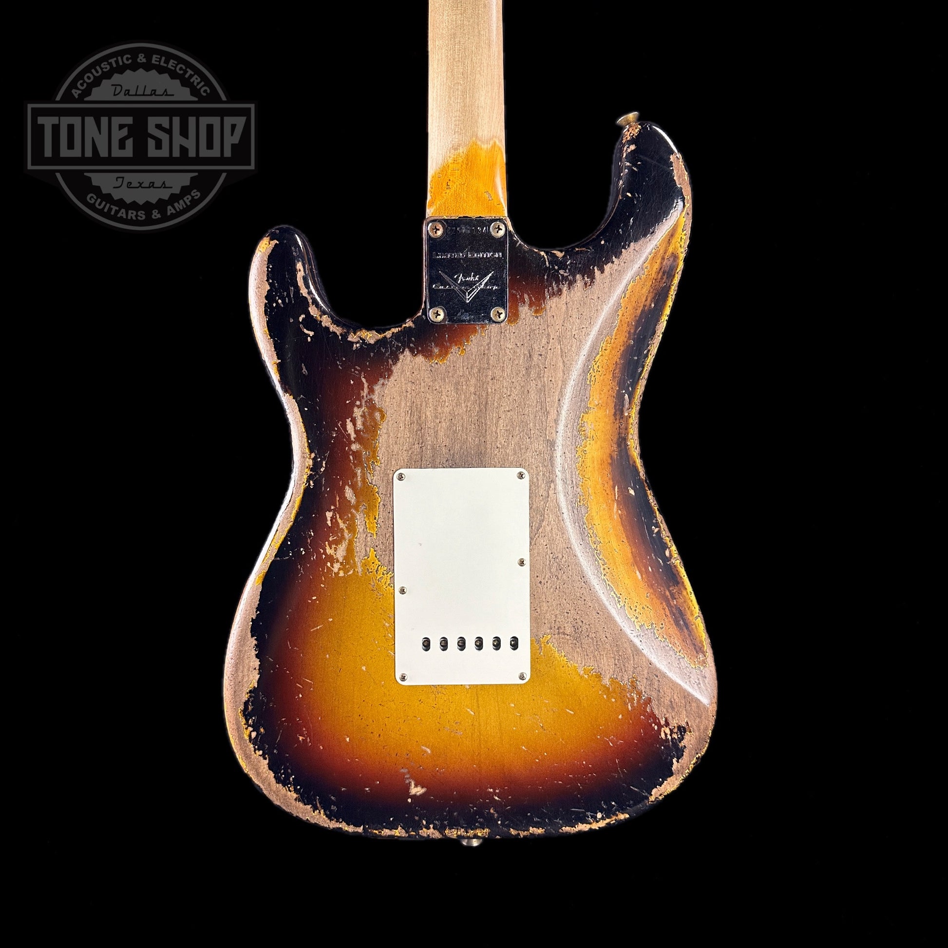 Back of body of Fender Custom Shop Limited Edition 61 Bone Tone Strat Super Heavy Relic Super Faded Aged 3 Color Sunburst.