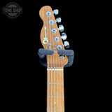 Used Charvel Pro-Mod So-Cal Style 2 24 HH - Natural Ash headstock with a black guitar stand on a black background, featuring the Tone Shop logo.