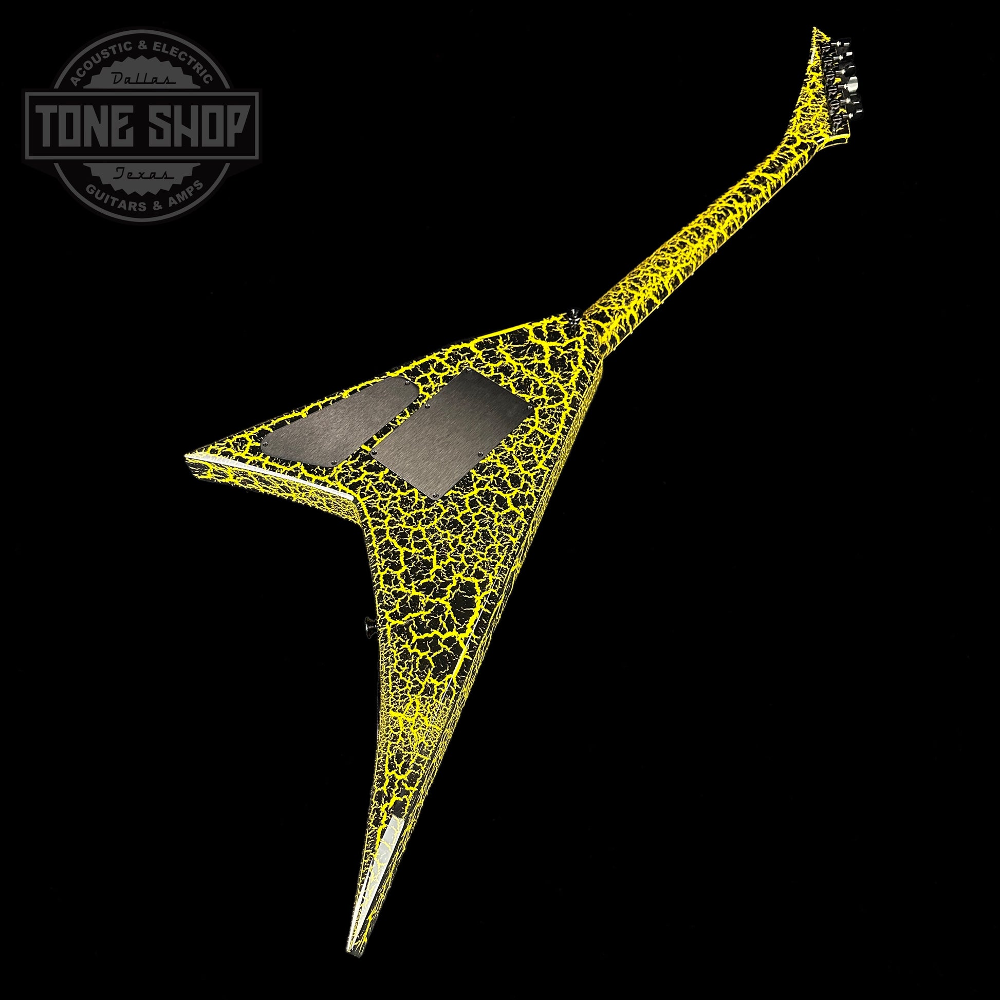 Back angle of Jackson Custom Shop Limited Edition Randy Rhoads Nos Black With Yellow Crackle.