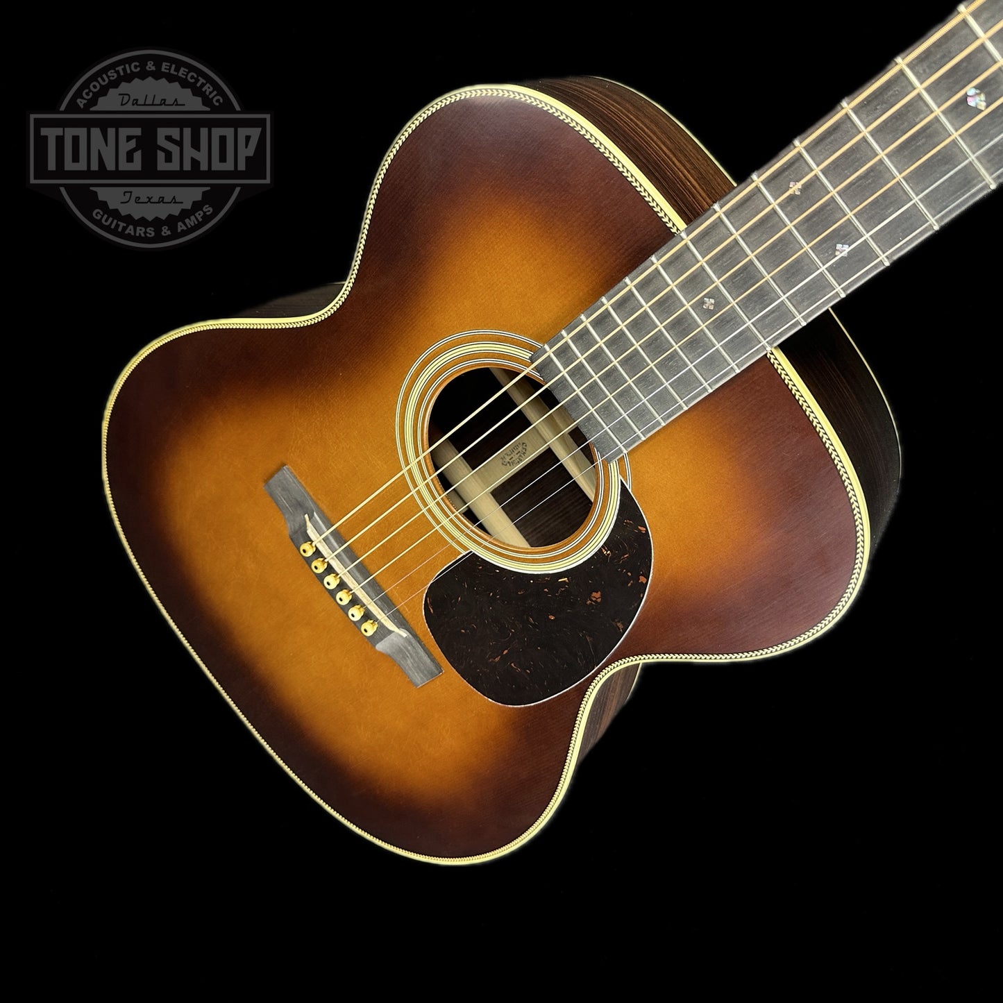 Front angle of Martin Custom Shop 000-28 Authentic 1937 Vintage Low Gloss w/Stage 1 Aging w/Ambertone Burst.