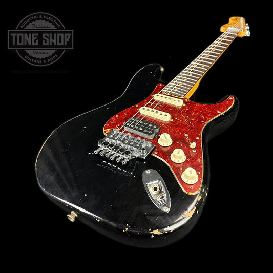 Front angle of Fender Custom Shop '69 Stratocaster Relic HSS Black Reverse Headstock.
