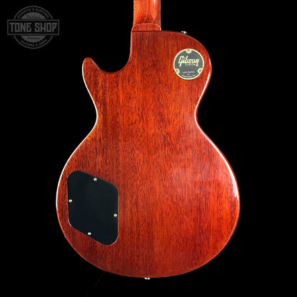 Back view of a Gibson electric guitar with a visible brand logo on a black background.