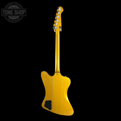 Yellow electric guitar on a black background with 'Tone Shop' logo.