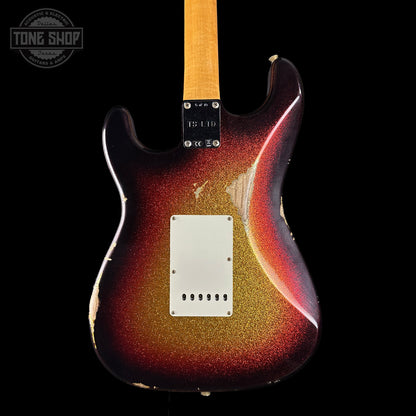 Glossy finish electric guitar with a sunburst color pattern on a black background