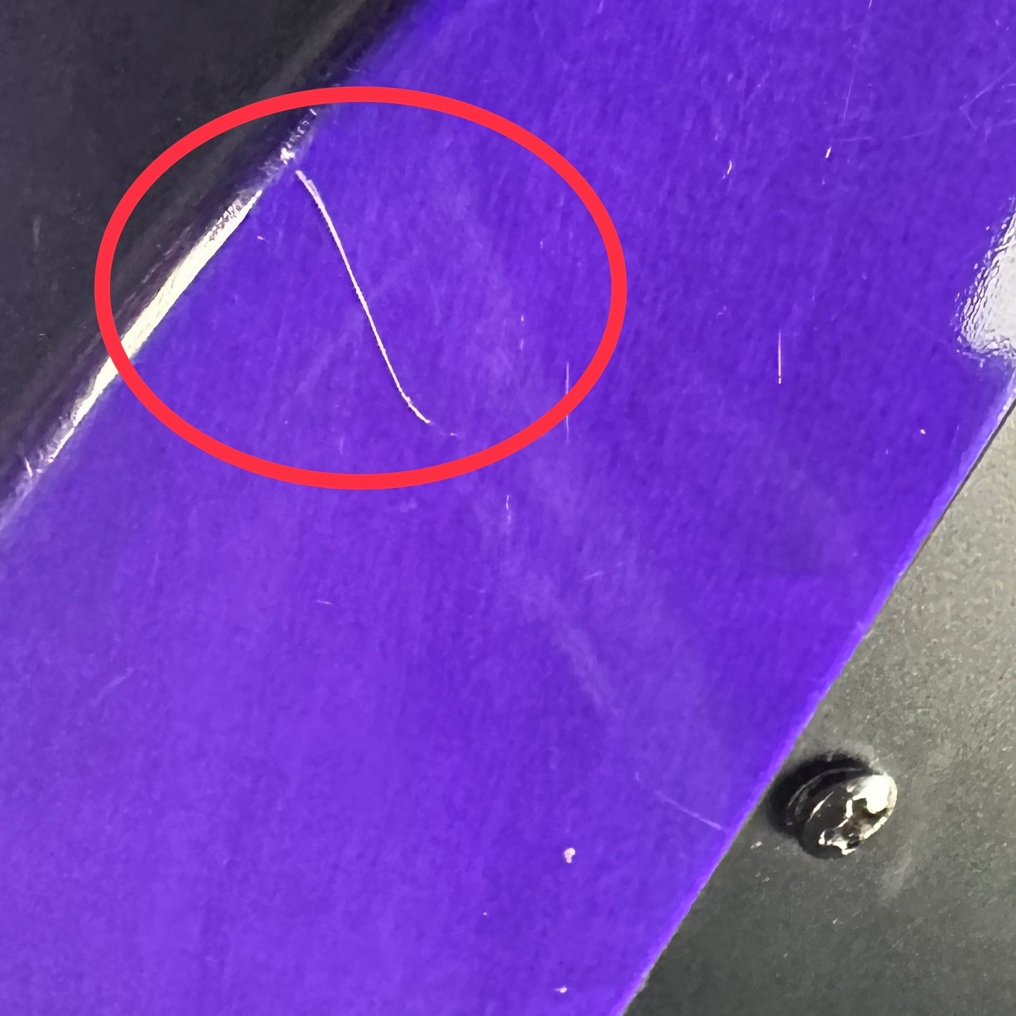 Scratch on back edge of Used Jackson JS22Q Purple.