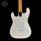 White electric guitar with a maple neck on a black background, featuring the Tone Shop logo.
