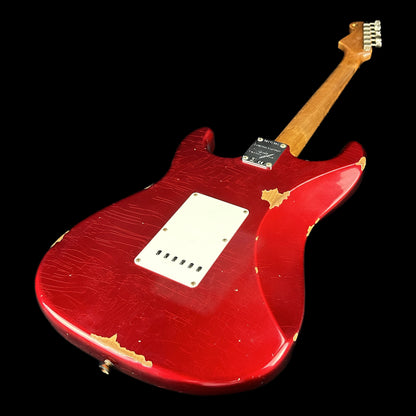 Back angle of Fender Custom Shop Limited Edition '63 Strat Relic Aged Candy Apple Red.