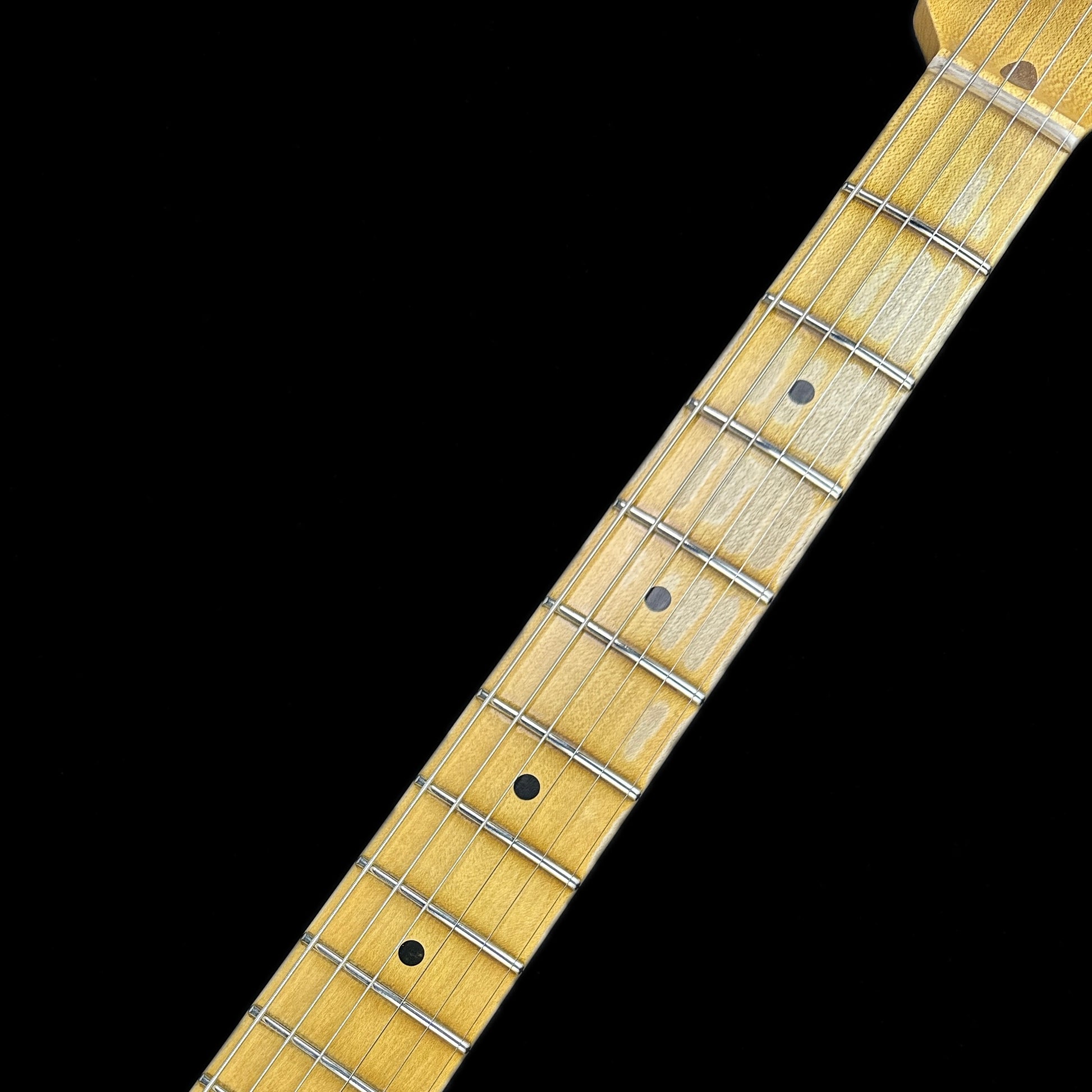 Fretboard of Fender Custom Shop LTD 70th Anniversary 1954 Stratocaster Relic 2-Color Sunburst.