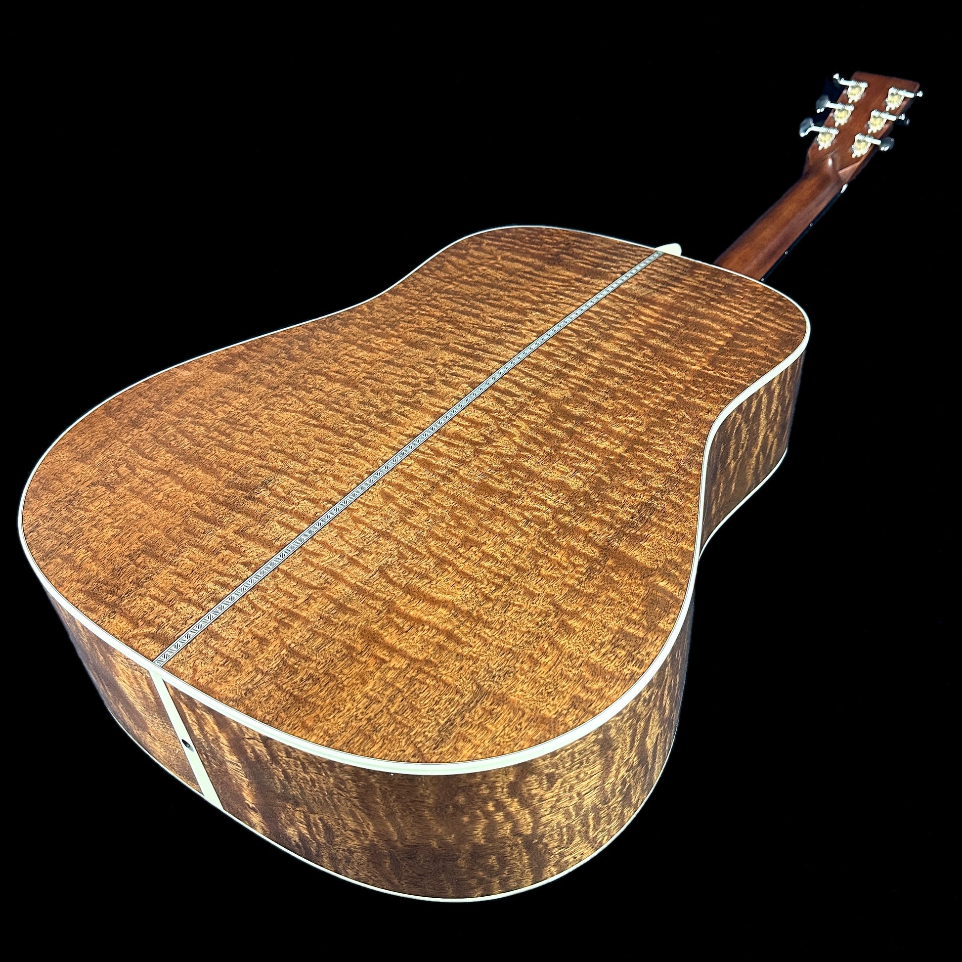 Back angle of Martin Custom Shop 28 Style Dread Adirondack/Quilted Sapele.