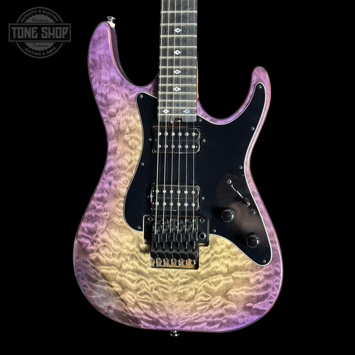 Used Kramer Volante Quilt guitar with a gradient purple to yellow finish on a black background, featuring 'Tone Shop' branding.