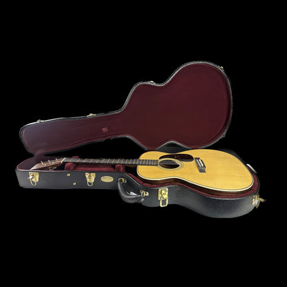 Left side of Martin Custom Shop 28 Style 0000 Adirondack/WEIR in case.