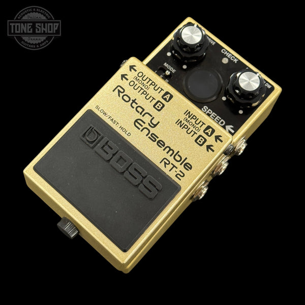 Boss RT-2 Rotary Ensemble pedal on a black background with 'Tone Shop' logo.
