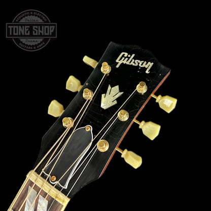 Front of headstock of Gibson Acoustic 1960 Hummingbird Murphy Lab Light Aged Heritage Cherry Sunburst.