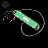 back of Used Seymour Duncan JB Jr for Strat TSS7190 pickup with wires on a black background, featuring 'Tone Shop' branding.
