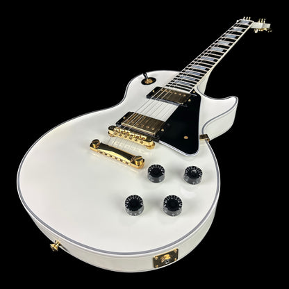 Front angle of Used Gibson Custom Shop Les Paul Custom Alpine White.