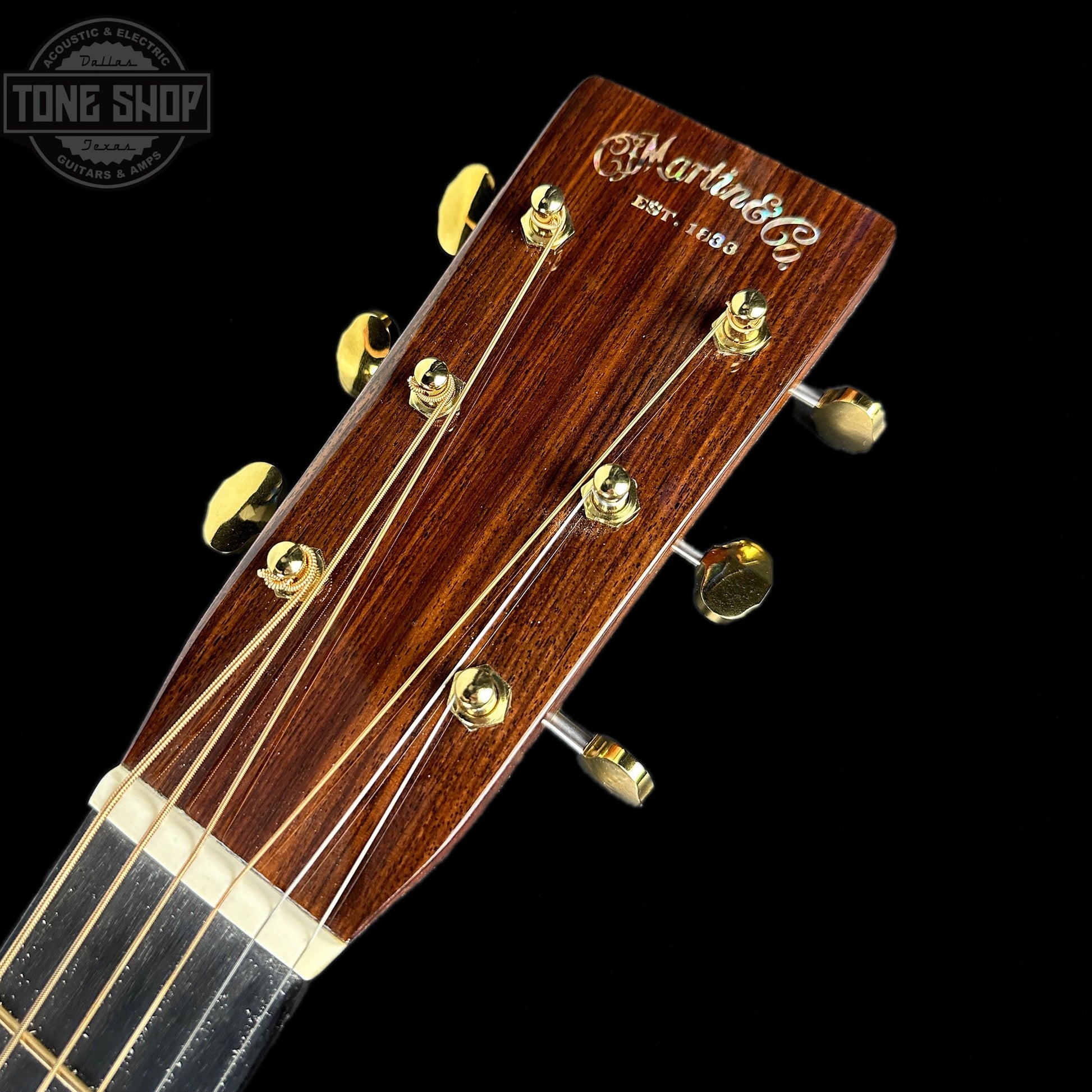 Front of headstock of Used Martin D-28 Modern Deluxe.