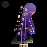 Headstock of Used 2024 Squier Bass VI FSR Purple TSS7704.