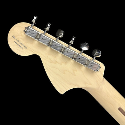 Back of headstock of Used Fender Limited Edition Tom Delonge Stratocaster Daphne Blue.