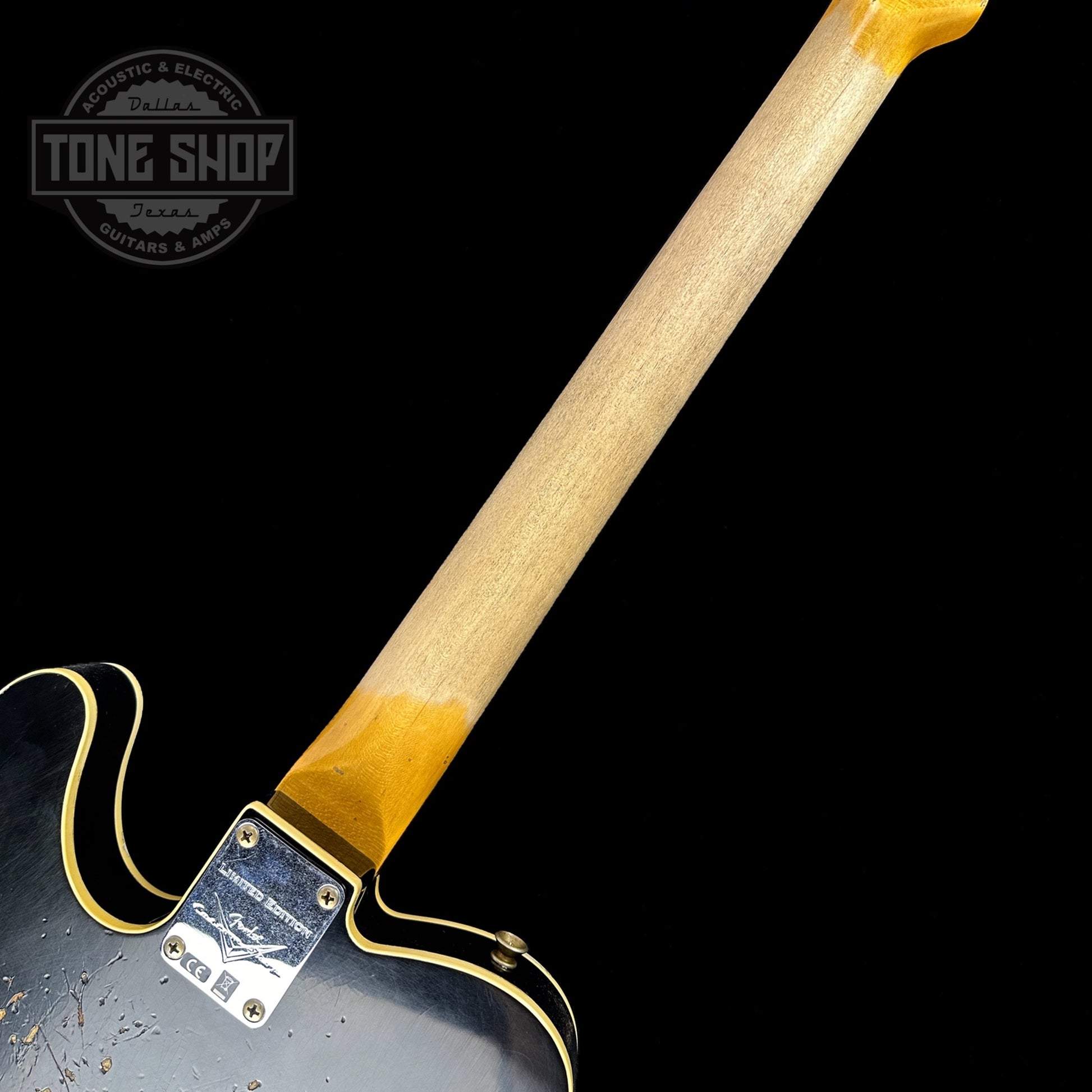 Back of neck of Fender Custom Shop Limited Edition Reverse '60 Tele Custom Heavy Relic Aged Black Over 3 Color Sunburst.