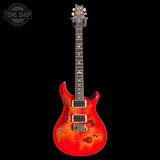 Red PRS Custom 24 electric guitar on a black background with 'Tone Shop' logo.