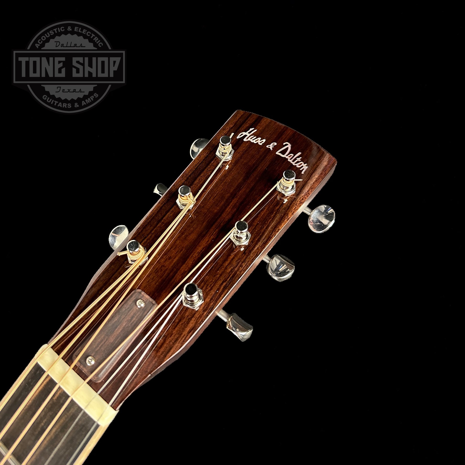 Front of headstock of Huss & Dalton DS Thermo-Cured Red Sprurce/Figured East Indian Rosewood Sunburst.