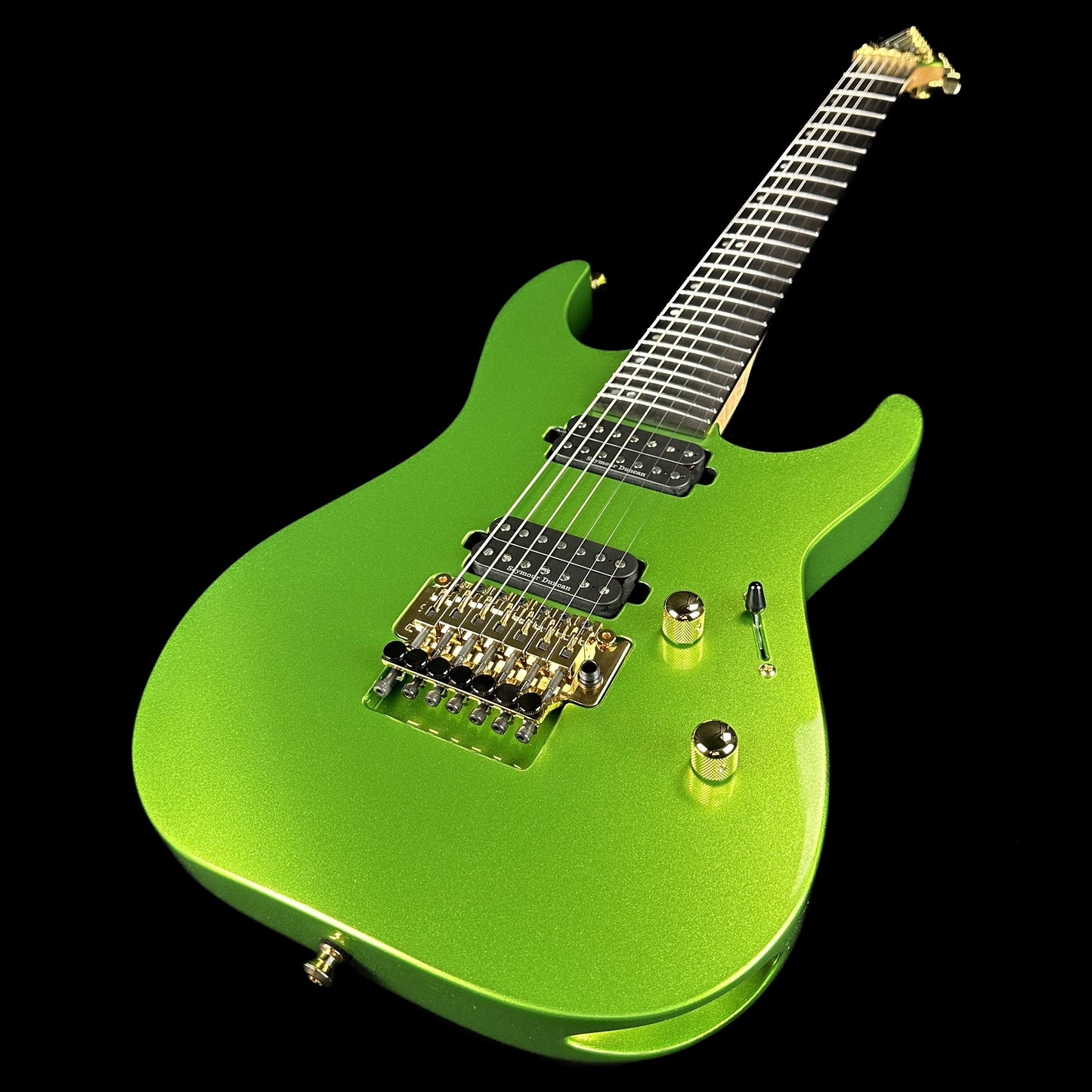 Front angle of ESP USA M-7 FR E GH SD Lizard Spit Green Metallic.