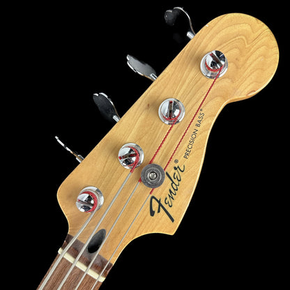 Front of headstock of Used 2009 Fender Standard Precision Bass Brown Sunburst.