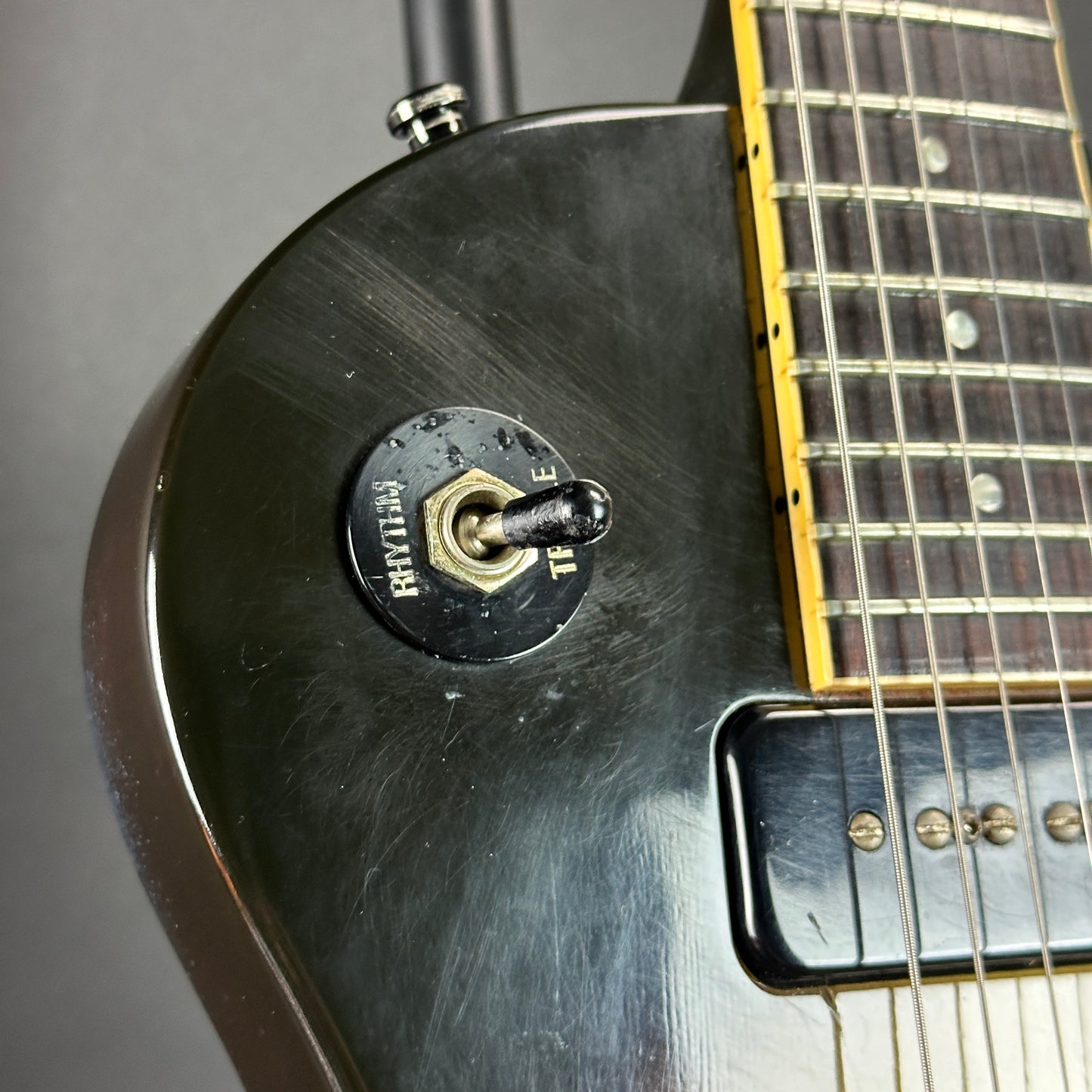 Scratches near pickup selector of Used 1989 Gibson Les Paul Special Burst.