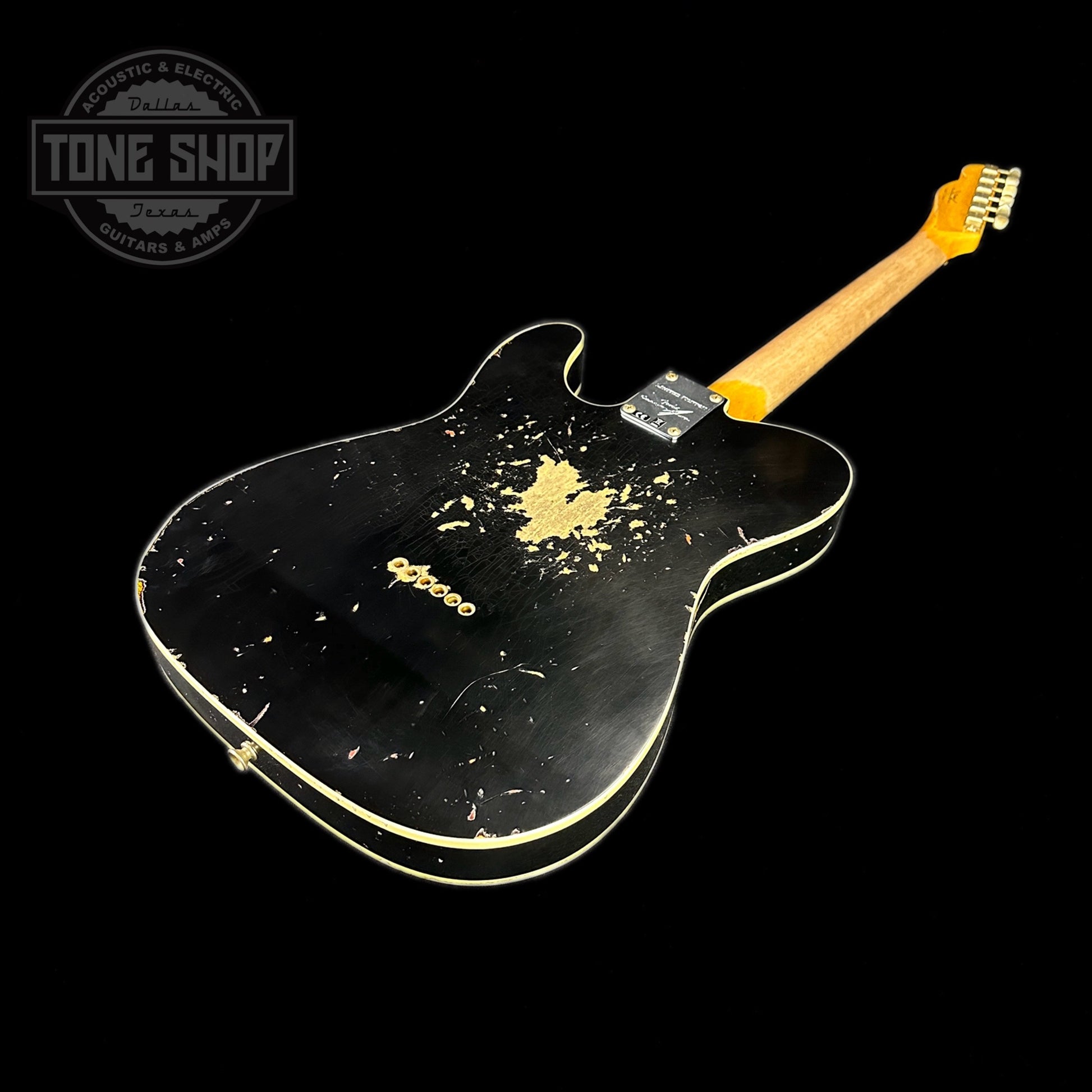 Back angle of Fender Custom Shop Limited Edition Reverse '60 Tele Custom Heavy Relic Aged Black Over 3 Color Sunburst.