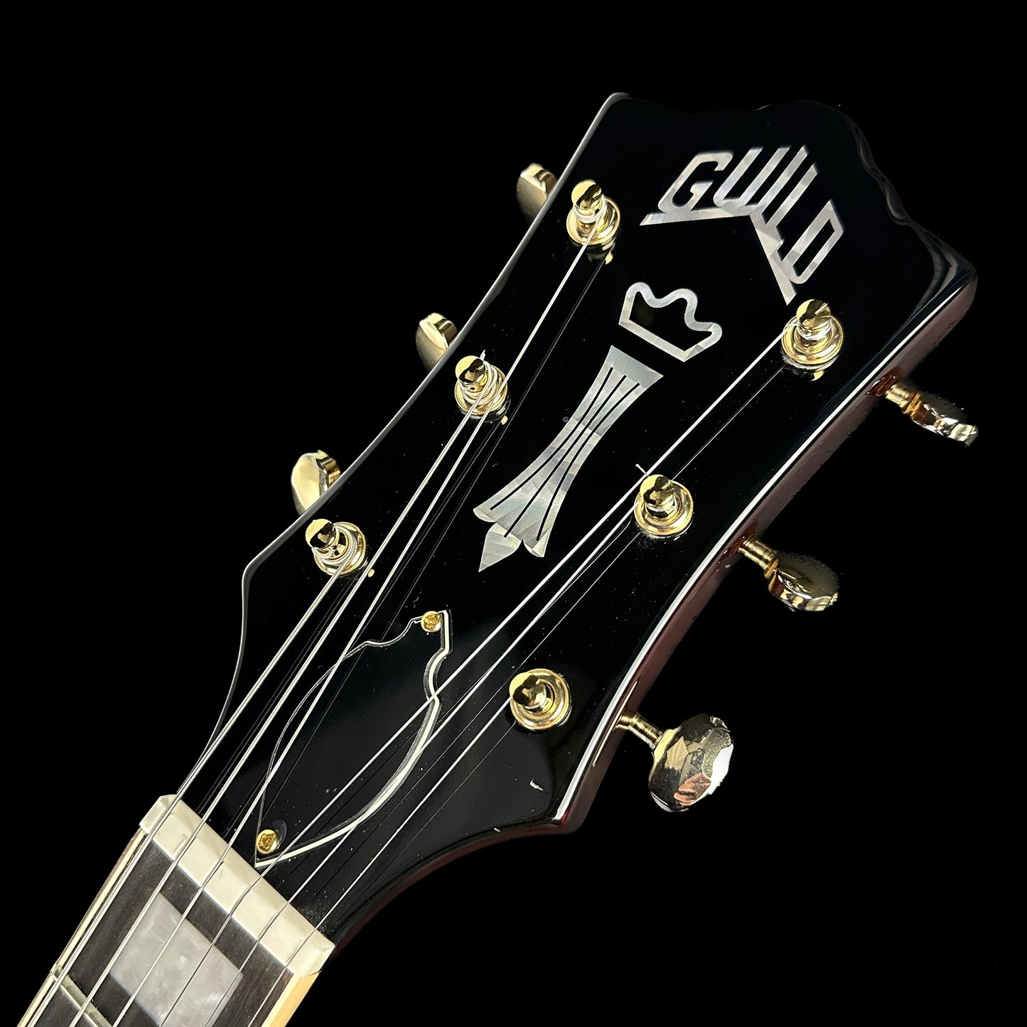 Front of headstock of Used Guild Aristocrat P90.
