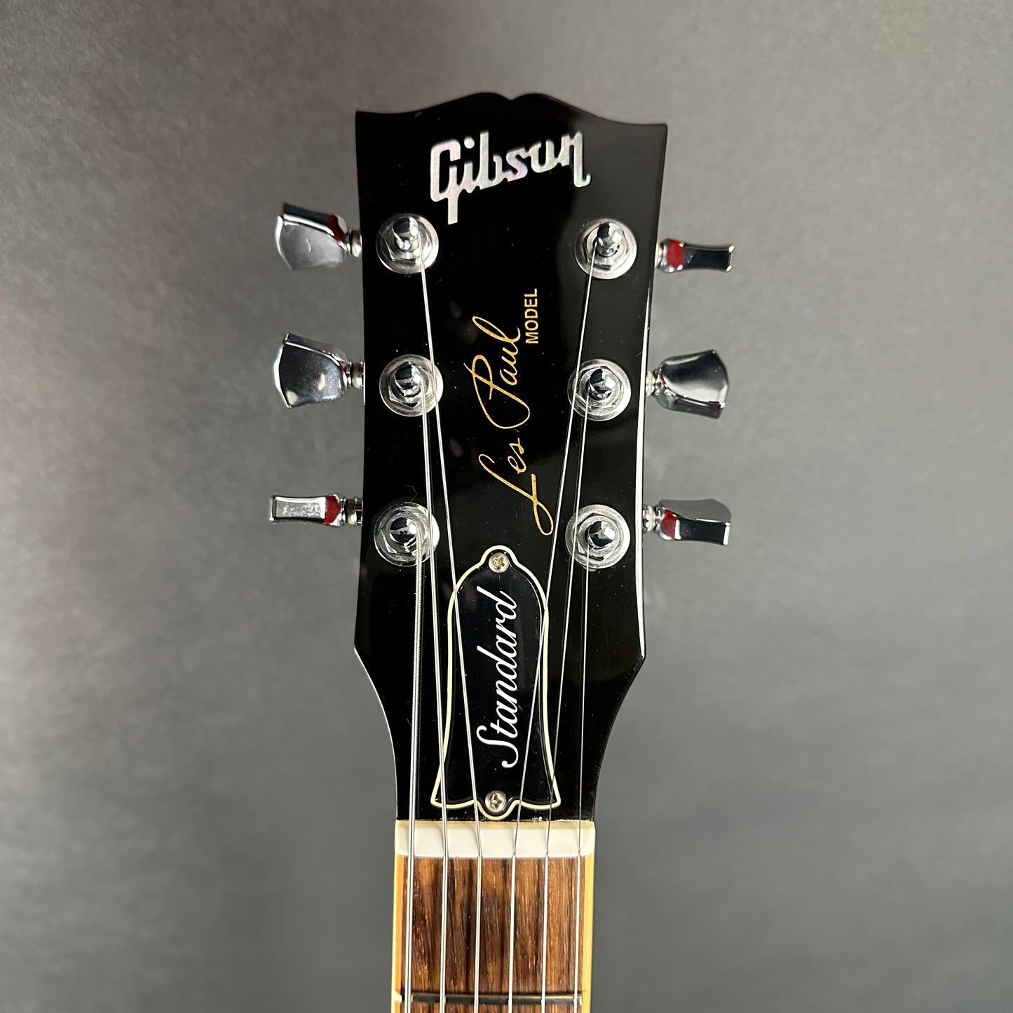 Front of headstock of Used 2008 Gibson Les Paul Standard Plus Heritage Cherry.