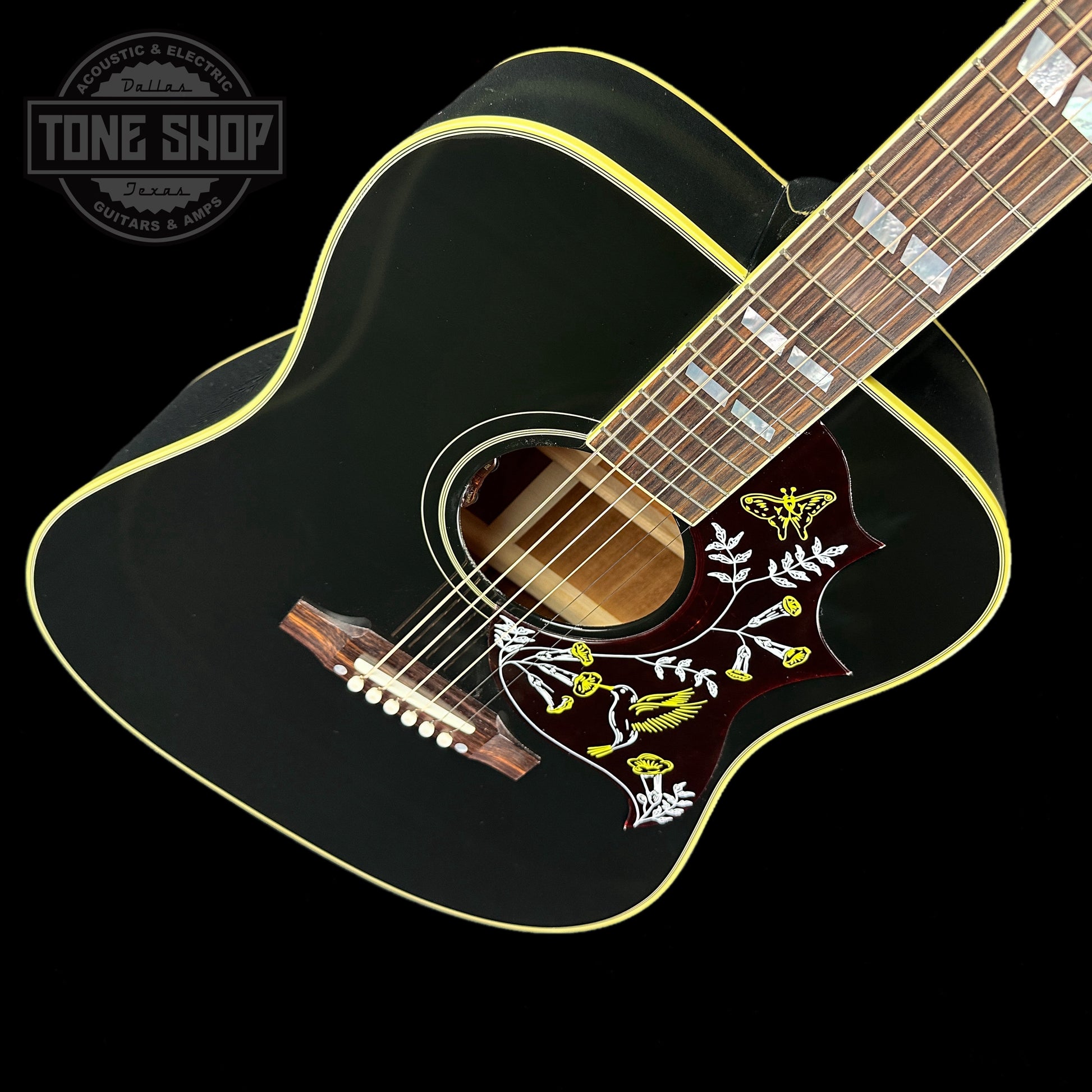 Front angle of Gibson Custom Shop M2M Hummingbird Original Ebony Gold HW.