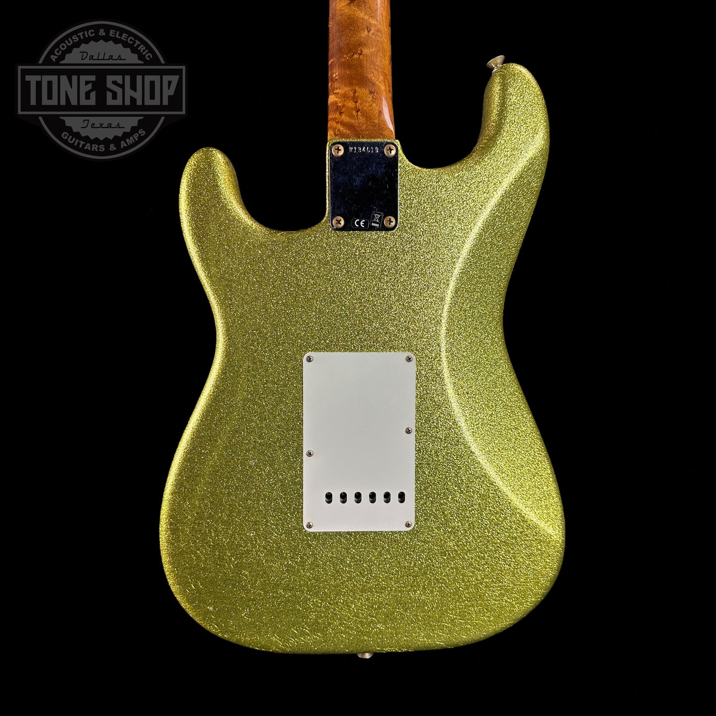 Back of body of Fender Custom Shop 1964 Stratocaster Journeyman Relic Chartreuse Sparkle.