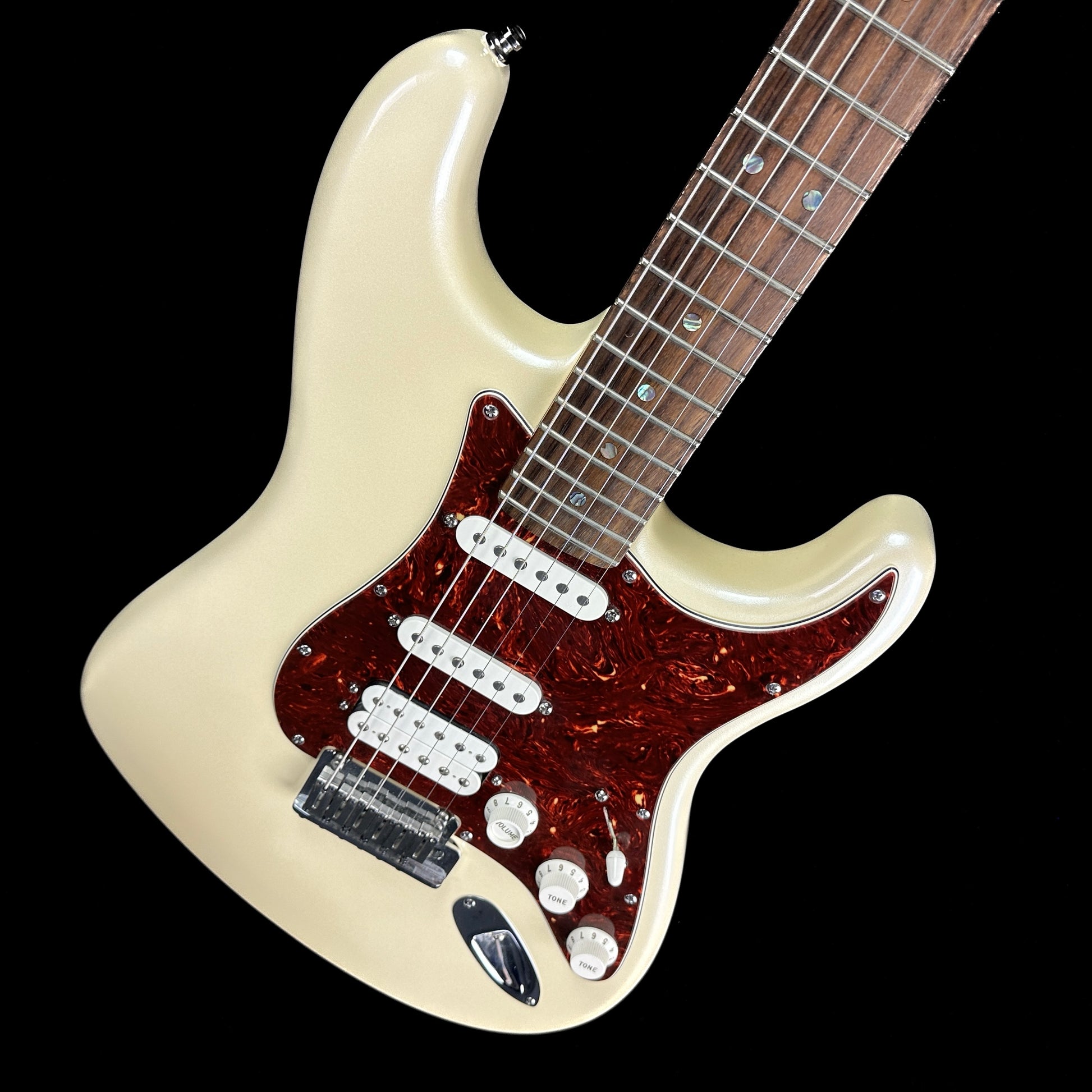 Front angle of Used 2006 Fender American Deluxe Stratocaster HSS Olympic White.