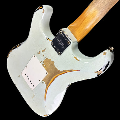 Back angle of Fender Custom Shop 1961 Strat Heavy Relic Super Faded Aged Sonic Blue/3-Color Sunburst.