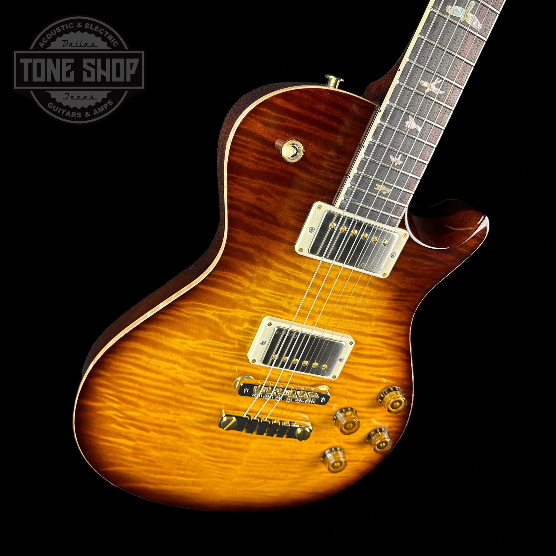 Front angle of PRS Paul Reed Smith McCarty 594 Singlecut 10 Top Tobacco Sunburst Hybrid Package.